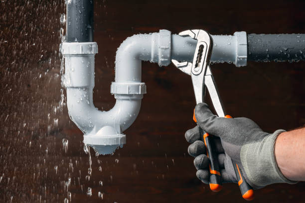 Professional Drain Cleaning technician working in Booneville, MS